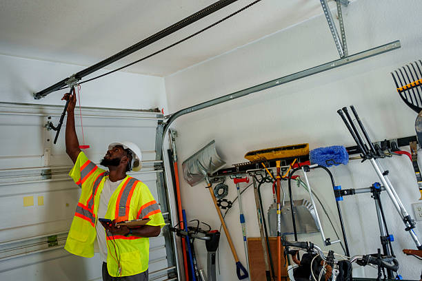 Professional Garage Door Panel Replacement technician working in Enoch, UT